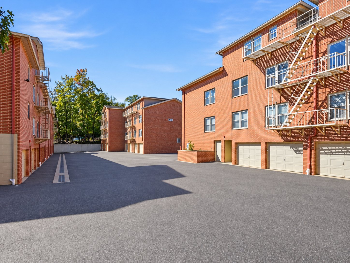 Parking courtyard and garages at Upper Mountain Gardens, Montclair