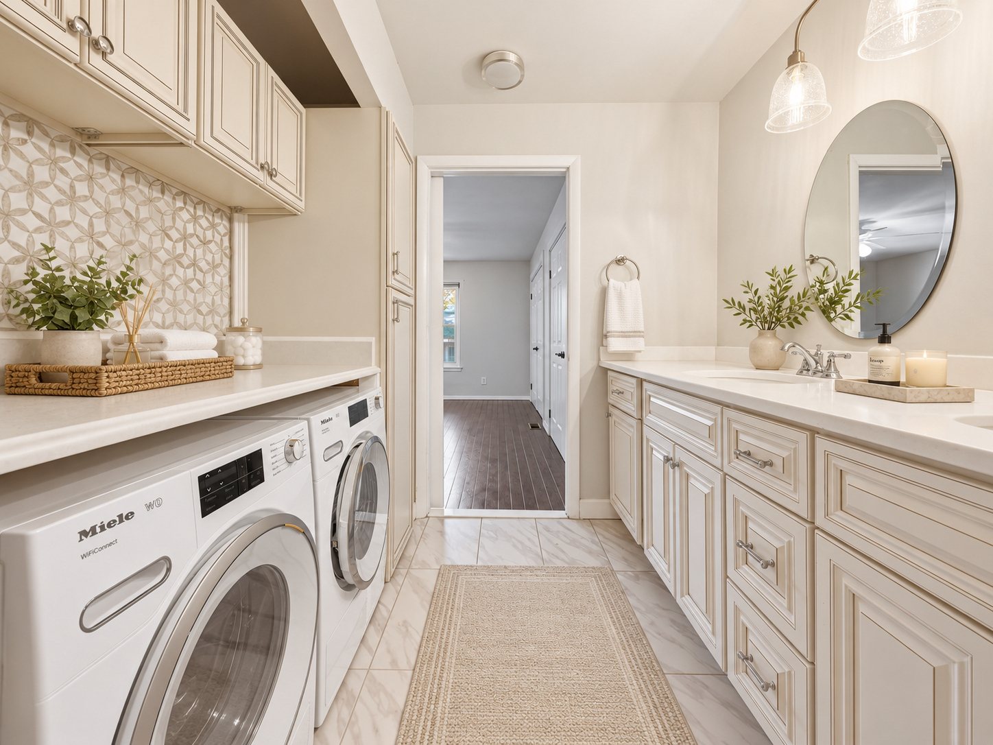 Washer, dryer, and vanity in the second-floor bath and laundry