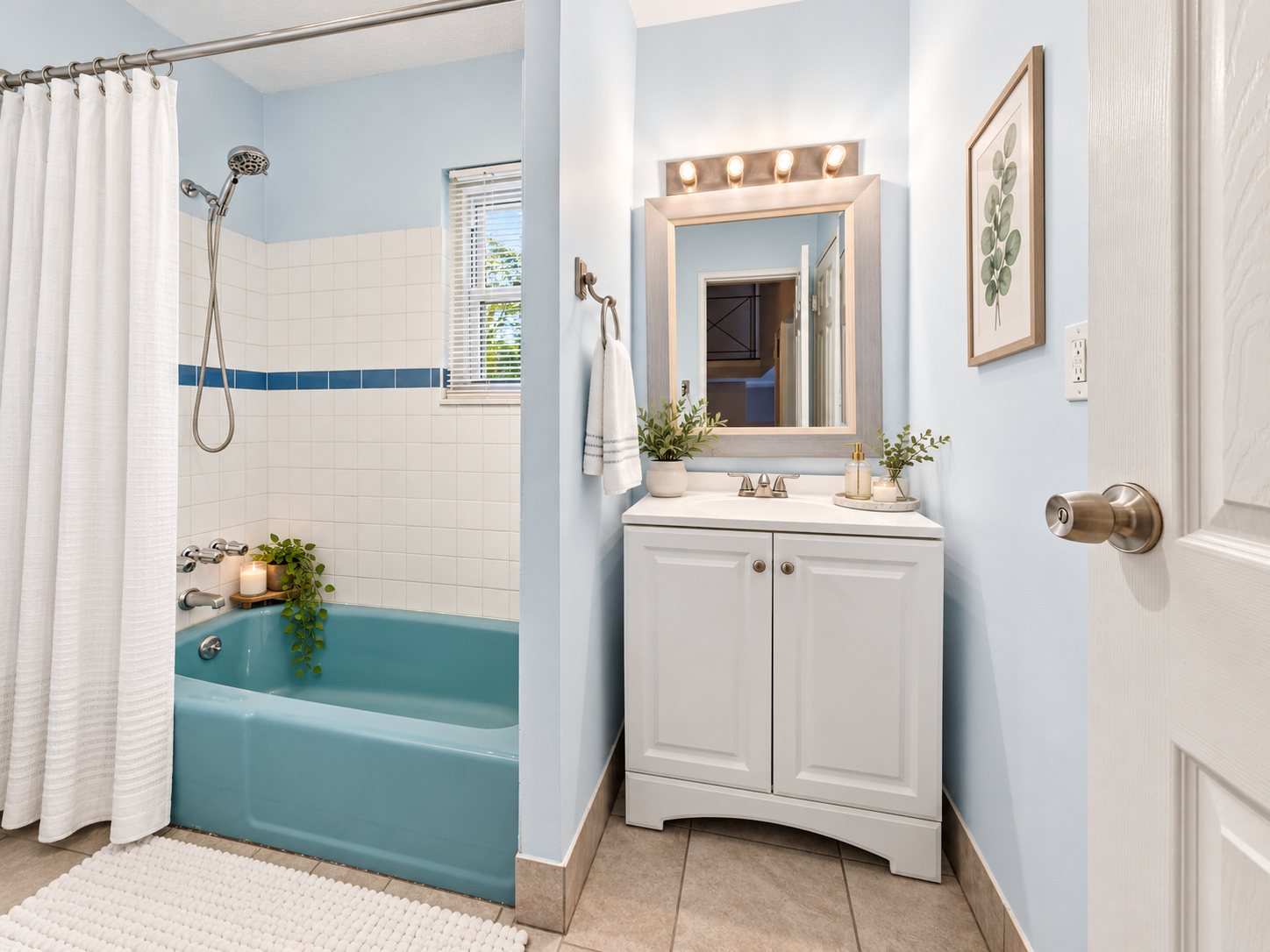 Full bath with tub and shower on the first floor